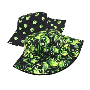 Reversible bucket hats with green alien and skull patterns for outdoor sun protection