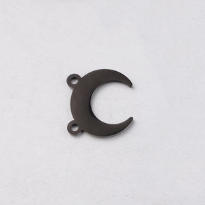 Detailed view of black crescent horn charm with double holes for DIY jewelry making