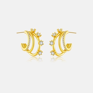 Detail showing 925 silver C-shape hoop earrings with sparkling white zircons and gold finish