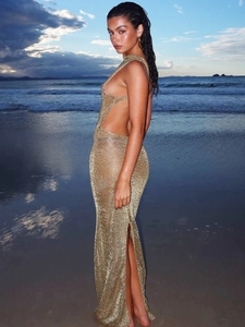 Golden knit backless maxi dress with side slit and crochet design for beach vacation