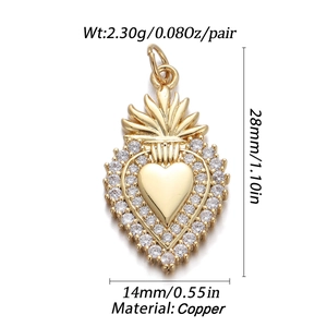 Detail view of heart pendant with precise measurements in mm and inches, copper material