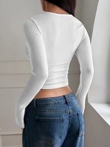 Slim fit white ribbed long sleeve crop top with an elegant back view for women