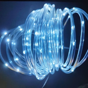 Close-up of flexible bright blue LED solar rope light with waterproof PVC tubing