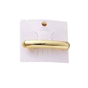 Elegant gold metal spring hair clip for women on white display card packaging