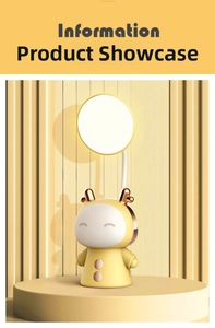 Detailed view of the deer-shaped LED lamp with a golden horn button and USB port