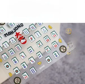 Detailed view of 5D mahjong nail stickers with transparent backing and lucky symbols