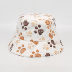 Detail of soft white plush bucket hat featuring brown animal paw print patterns