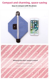 Waterproof blue striped makeup bag showing compact size vs phone and water drops