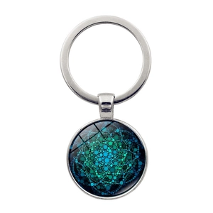 Mandala flower of life glass pendant keychain with silver metal ring on white background