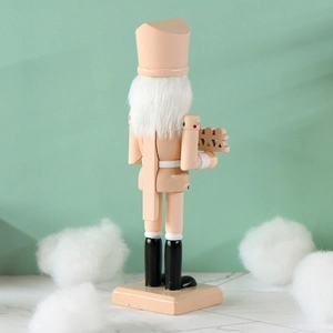 Pink 25cm gingerbread soldier nutcracker Christmas decoration shown from the back view