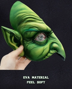 Detail showing the soft green EVA material and wrinkled texture of the witch mask