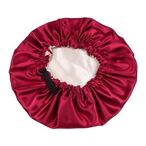Detail view of double-layer satin sleep bonnet in wine red with adjustable elastic strap