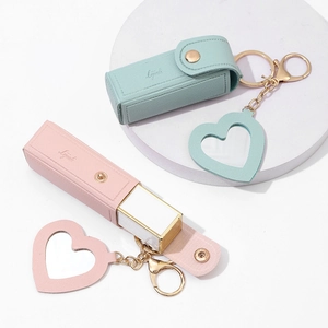 Mini leather lipstick case keychain with heart mirror charm in pink and green colors