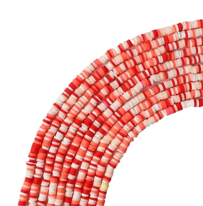 Primer plano de cuentas de arcilla polimérica de 4 mm rojas, naranjas y blancas para joyería