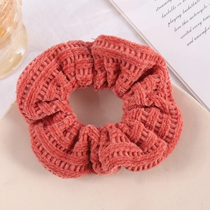 Knitted terracotta waffle texture oversized scrunchie for ponytail styling in autumn
