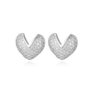 Detailed view of silver heart-shaped V-stud earrings with pavé cubic zirconia