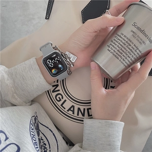 Detail of LED digital watch with astronaut pattern and stylish metal chain strap