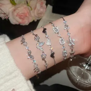 Elegant silver flower and butterfly bracelet with sparkling cubic zirconia for women
