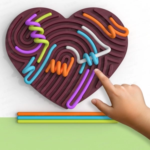 Detailed macro view of heart-shaped silicone sensory board with colorful tactile strings