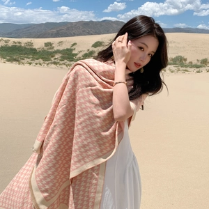 Pink and beige houndstooth cashmere-like winter scarf wrap for women in desert setting