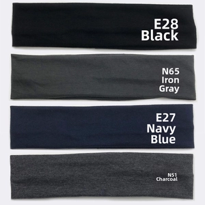 Detailed knit texture of athletic headbands in black, navy, and grey cotton fabric