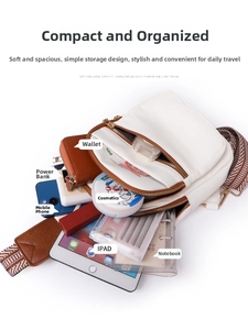 Internal view of a white crossbody bag showing spacious capacity for iPad and phone