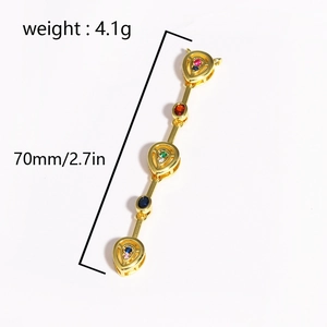 Detail view of 70mm gold-tone drop earrings with colorful zircon inlays and measurements