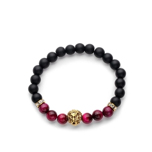 Black matte and red beads bracelet with golden lion head and crystal spacers on white background