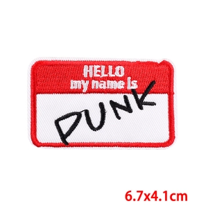 Detail of red and white HELLO my name is PUNK embroidered patch measuring 6.7x4.1cm
