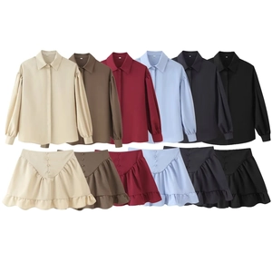 Two-piece shirt and ruffle mini skirt set in six assorted colors on white background