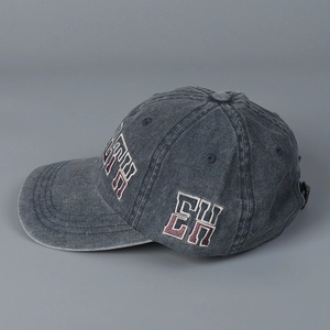 Vintage washed dark grey cotton baseball cap with embroidered letters and distressed details