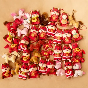 Collection of Year of the Horse plush mascot pendants in various colors and designs