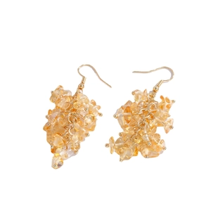 Handmade yellow crystal cluster tassel earrings with gold-toned hooks on white background
