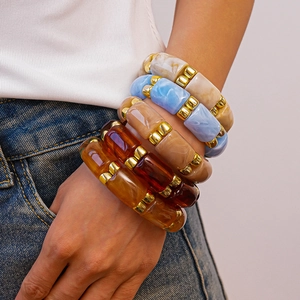 Chic chunky resin bangles with marble texture, gold metal spacers and vibrant multi-colors