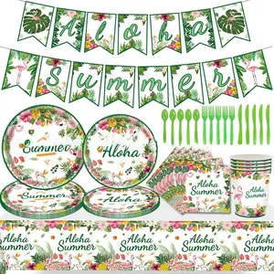 Detail of Hawaiian party tablecloth with flamingo and tropical leaf print patterns