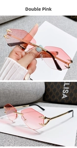 Detail of rimless sunglasses with pink gradient lenses and golden claw metal ornaments