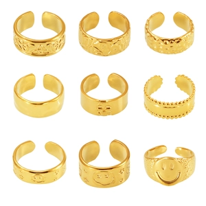 Set of 9 vintage 18k gold plated stainless steel adjustable rings in various designs