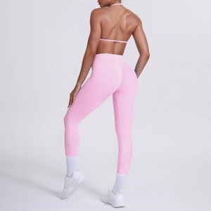 Completo da yoga rosa con leggings a vita alta senza cuciture e reggiseno sportivo