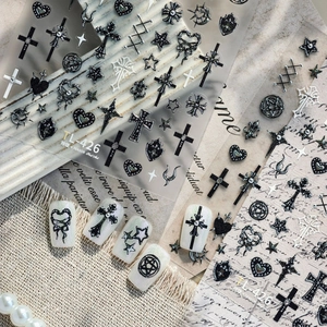 Gothic nail art stickers with black crosses and stars for a 3D relief punk manicure