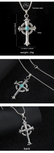 Detail view of Celtic cross necklace with turquoise stone inlay and specific dimensions