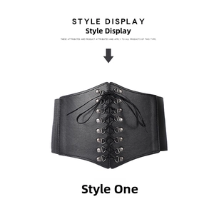 Detail of vintage black corset belt with lace-up front and wide elastic waist band