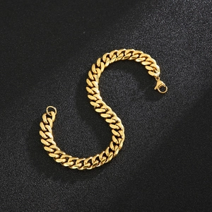Close-up of polished 18k gold plated stainless steel 8mm Cuban link bracelet with lobster clasp