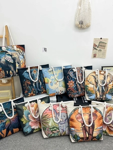 Ethnic embroidered canvas tote bag with elephant patterns and cotton rope handles
