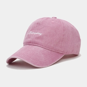 Detail of Everyday embroidery on washed pink cotton baseball cap with curved brim