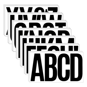 Close-up of 6-inch waterproof uppercase letter stickers with bold black vinyl fonts
