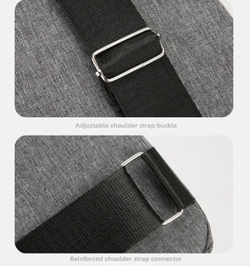 Detail of adjustable gray shoulder strap with durable nylon fabric and silver metal buckle