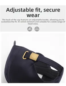 Close-up of navy cotton baseball cap featuring an adjustable brass metal buckle closure