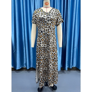 Detail of V-neck short sleeve maxi dress featuring leopard print and side split design