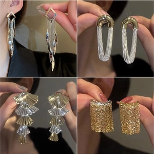 Four styles of elegant metal tassel earrings featuring gold and silver layered fringe
