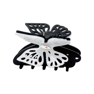 Elegante molletta per capelli a farfalla in acetato marmorizzato bianco e nero con cristallo
